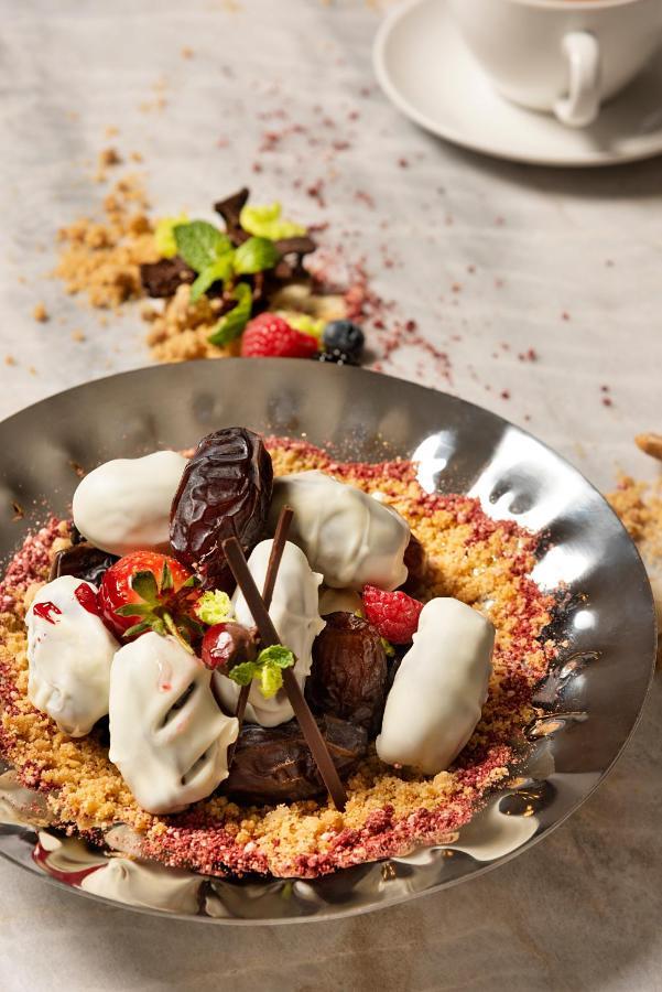 Asiana Grand Hotel Dubai Exterior photo A chocolate parfait